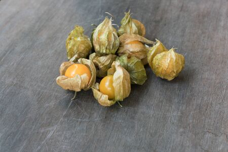 Goodsberries on the wood table are ready to serve.の写真素材