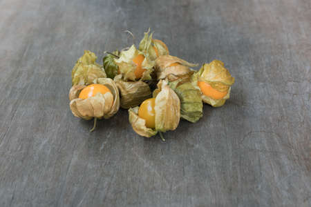 Goodsberries on the wood table are ready to serve.の写真素材