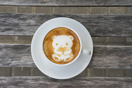 Coffee with Latte Art as Cute Bear holding heart for Valentine's dayの写真素材