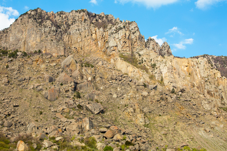 high mountain slope covered with small stones painted large expedition to the mountainsの写真素材