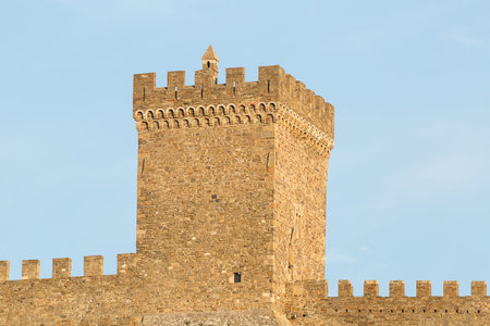 Krym Sudak ruins of the Genoese fortress old stone square tower with battlements on the roof of the fortification wallの写真素材