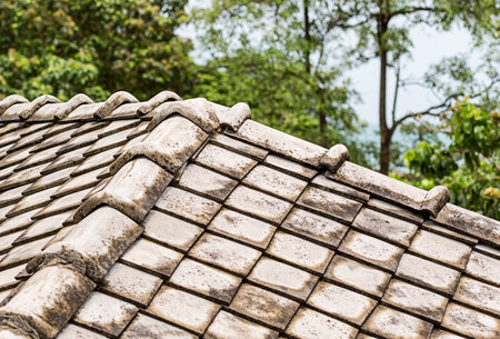 old tiled roof background square gray elements symmetrical patternの写真素材