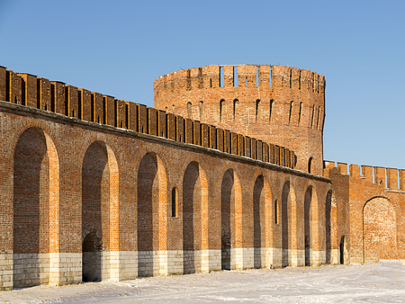 Arched wall old fort brick Russian city round big tower with a crenellated roof. Smolensk, Russia,の写真素材