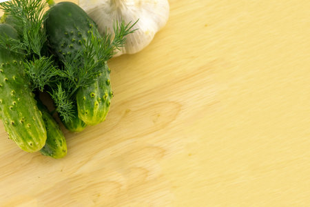 cucumber dill garlic whole set set pickled vegetables aromatic light snack for lunch on a wooden background copy spaceの写真素材