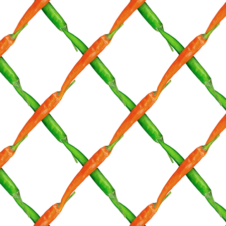 abstract background vegetable lattice pods chili pepper red green colorful background on a white base series of rhombuses designの写真素材