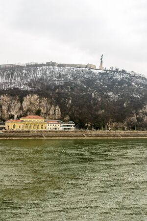 View of the Danube River with Mount Gellert and Citadel of the ancient building of the monument of freedom Budapest. Hungary Budapest 24 February 2018のeditorial素材