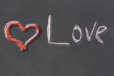 red heart Love chalk inscription handmade on black slate board design art festive baseの写真素材