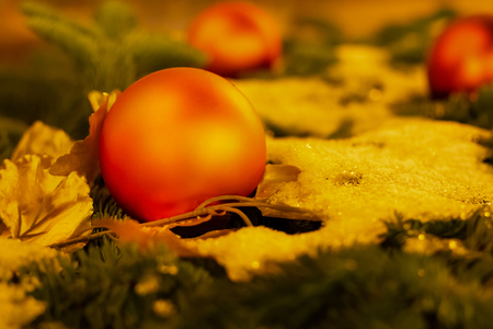 background orange red colorful balloon christmas decoration on snow copy space decor foundationの写真素材
