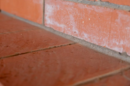 brick wall gray cement lines angle close-up construction design background