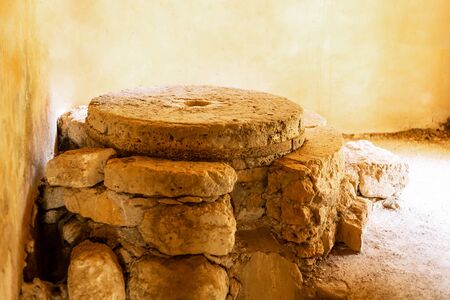 traditional flour production heavy stones flour mill old weathered destroyedの写真素材