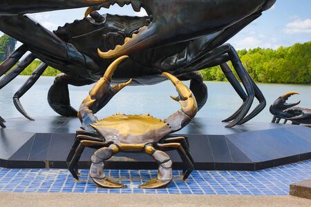 Thailand, Krabi province. August 2018, a close-up of the statue of a crab metal steam, a symbol of the province of Krabiの写真素材