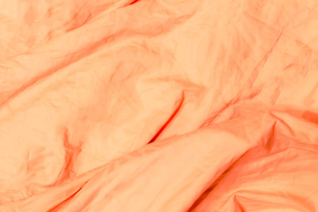 texture fabric natural peach pastel crumpled curved lines baseの写真素材