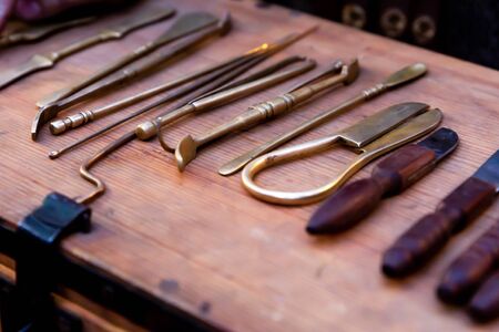 countertop of a merchant military surgeon's tools scalpel scapula close-upの写真素材