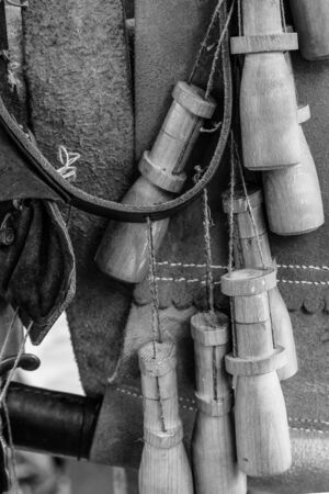base leather belt powder flask wooden background army copy spaceの写真素材