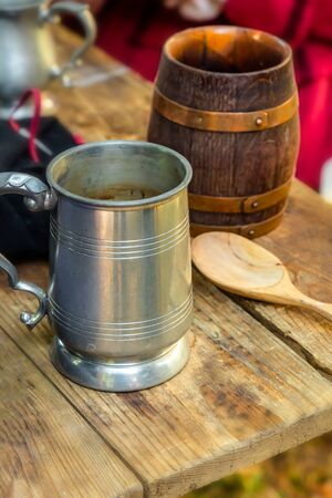 mug couple tin and clay vertical photo close-up on a wooden table pubの写真素材