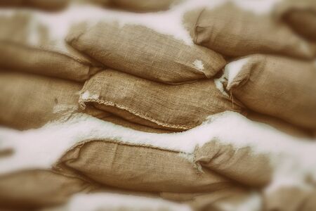 snow bag pattern background for shatter protection during war close-up covered snowの写真素材