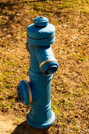 iron fire hydrant, traditional for extinguishing vertical photographyの写真素材