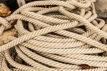 Cable long dark beige natural jute closeup marine backgroundの写真素材