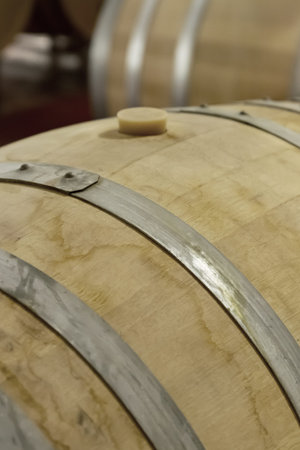 natural oak wine barrel close-up iron hoop extract port temple wine-making
