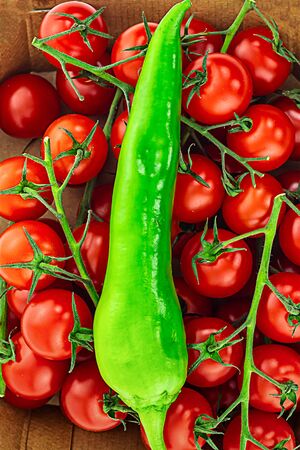 green pepper delicious spicy chili bright on cherry tomatoes branch. Set vegetable vertical photoの写真素材