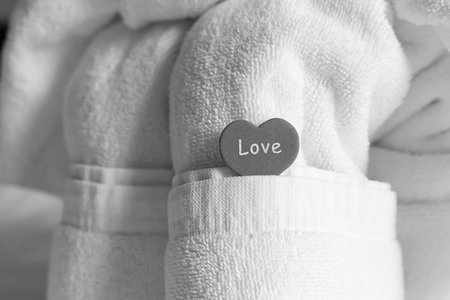towel white symbol of love heart tinted background, composition decor room wedding newlywedsの写真素材