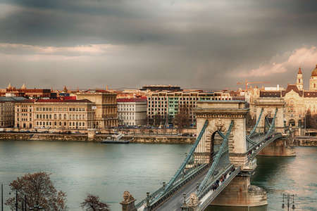 Hungary Budapest March 2018. HDR photo out of European city Budapest the chain bridge dark stormy sky view of Pestのeditorial素材