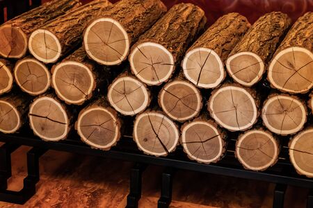 pile sawn branva round side view smooth symmetrical fuel fireplaceの写真素材
