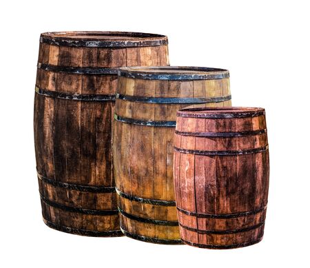 three wine barrels with scotch standing on a white background is used for storage and aging of the drinkの写真素材