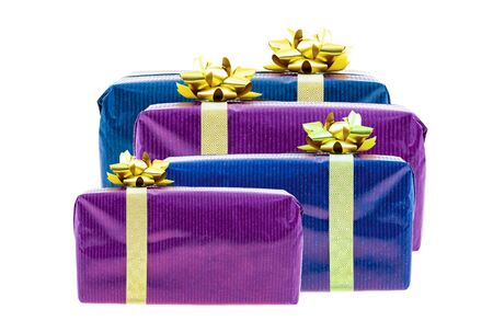 background festive set giftbox dark blue and lilac with golden ribbon and bow on an isolated basisの写真素材