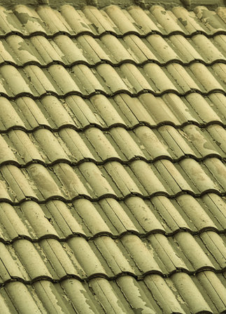 gray ceramic clay roof wavy old and weathered background vertical