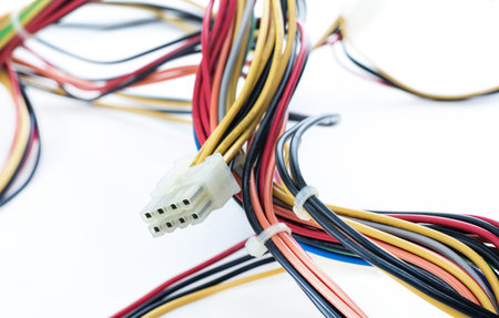 Tangled wires multicolored to provide power on isolated background