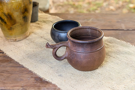 beer mug in the style of the middle ages stands on the tableの写真素材