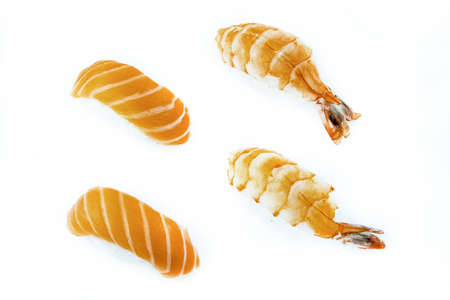 fresh sushi nigiri with salmon and shrimp on a white isolated backgroundの写真素材
