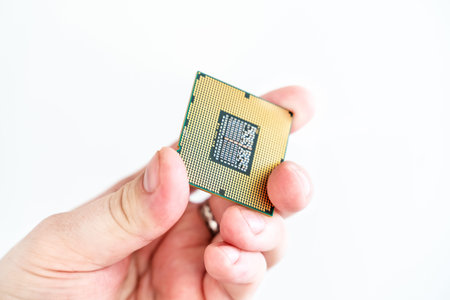 cpu (Central Processing Unit) or Microchip Computer in the hands of a master engineerの写真素材