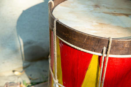 combat drum red yellow close up wooden musical instrument, soft focusの写真素材
