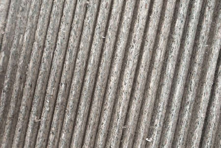 gray wooden background with parallel oblique lines, ribbed patternの写真素材