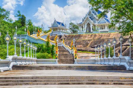 thailand Krabi province 03.08.2018. Temple Wat Kaew Korawaram white Temple in Krabi. Entrance to the temple with golden dragonsの写真素材