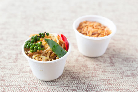 set of seasoning vegetables, caramelized onions and a set of mushrooms and a branch of green peppercornsの写真素材