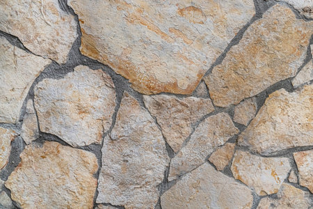 gray stone background with lines of cobblestones, city pavementの写真素材