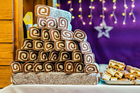 chocolate roll of marmalade on festive background