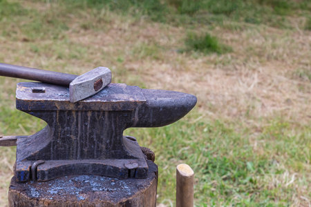 hammer and anvil traditional blacksmith tools for forgingの写真素材