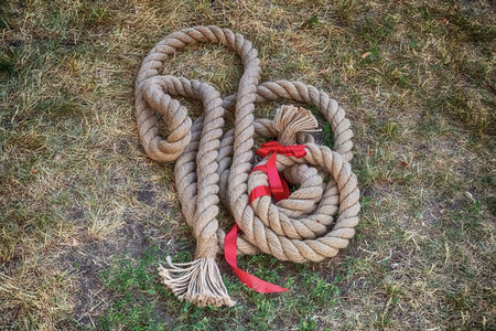 thick jute rope and ribbon, traditional fun at the fair, tug of war