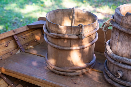 old and cracked wooden buckets traditional water containerの写真素材
