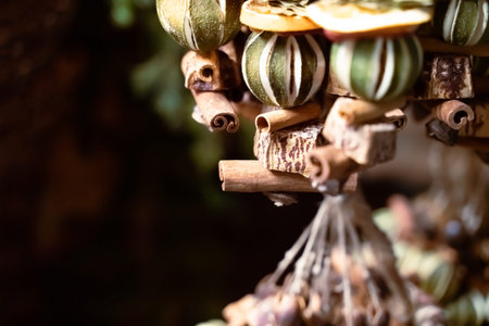 traditional Austrian christmas decoration made of dried fruits and plants close up with copy space, selective focusの写真素材