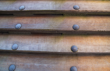 wooden background horizontal boards oak and iron rivets