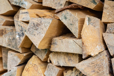 stack of chopped firewood close-up, a blank for heating a house