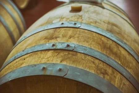 oak barrel with iron hoops for storing wine and sherry close-upの写真素材