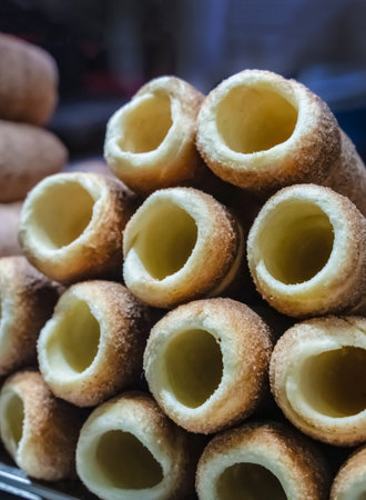 stack of trndeliki close-up sprinkled with sugar and cinnamonの写真素材