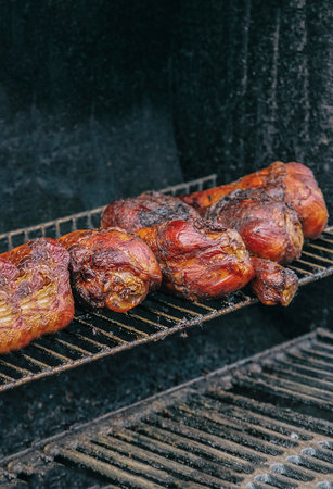 turkey meat row of legs fried with appetizing crust on a grill grillの写真素材