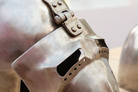 iron knight helmet with visor close-up, protection of a medieval warriorの写真素材